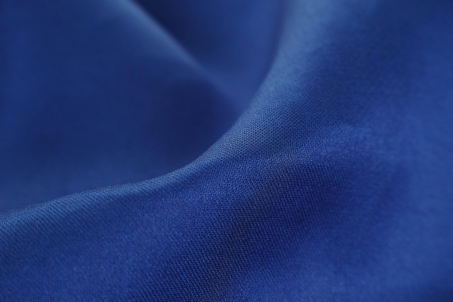 A close-up of a blue fabric.