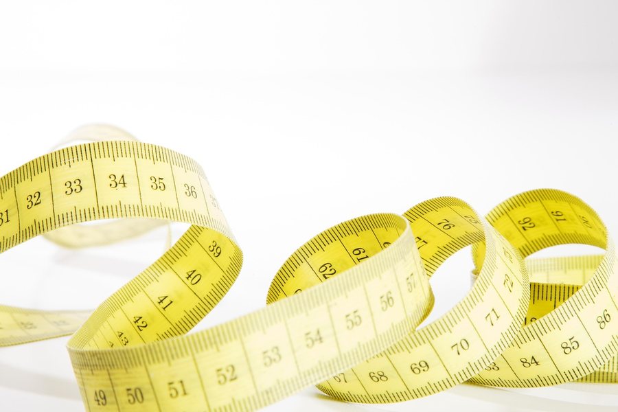 A coiled measuring tape.