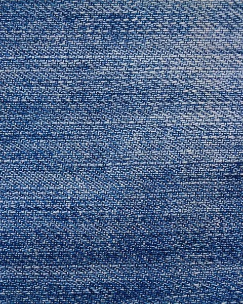 The weave of raw indigo denim.